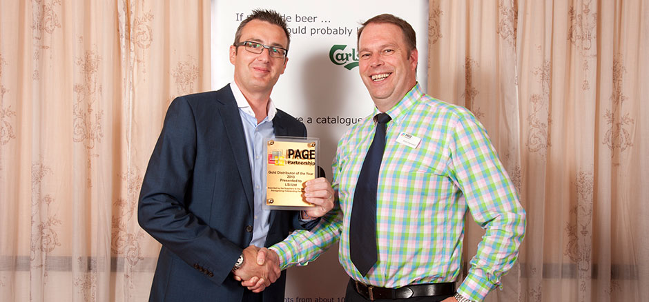 Chris Dickinson receiving the PAGE Distributor of the Year award