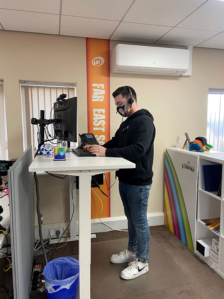 oliver at stand up desk